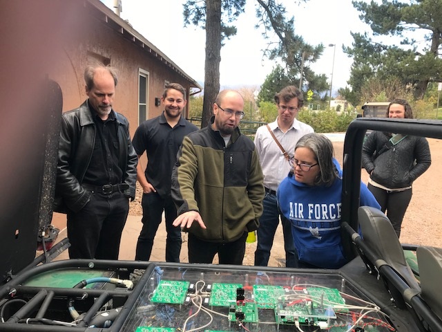 students learning about EV batteries